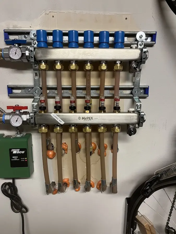 Plumber performing Water Heater Repair at a residential property in Stanley